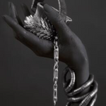 Black Woman With Silver Jewellery Wall Art